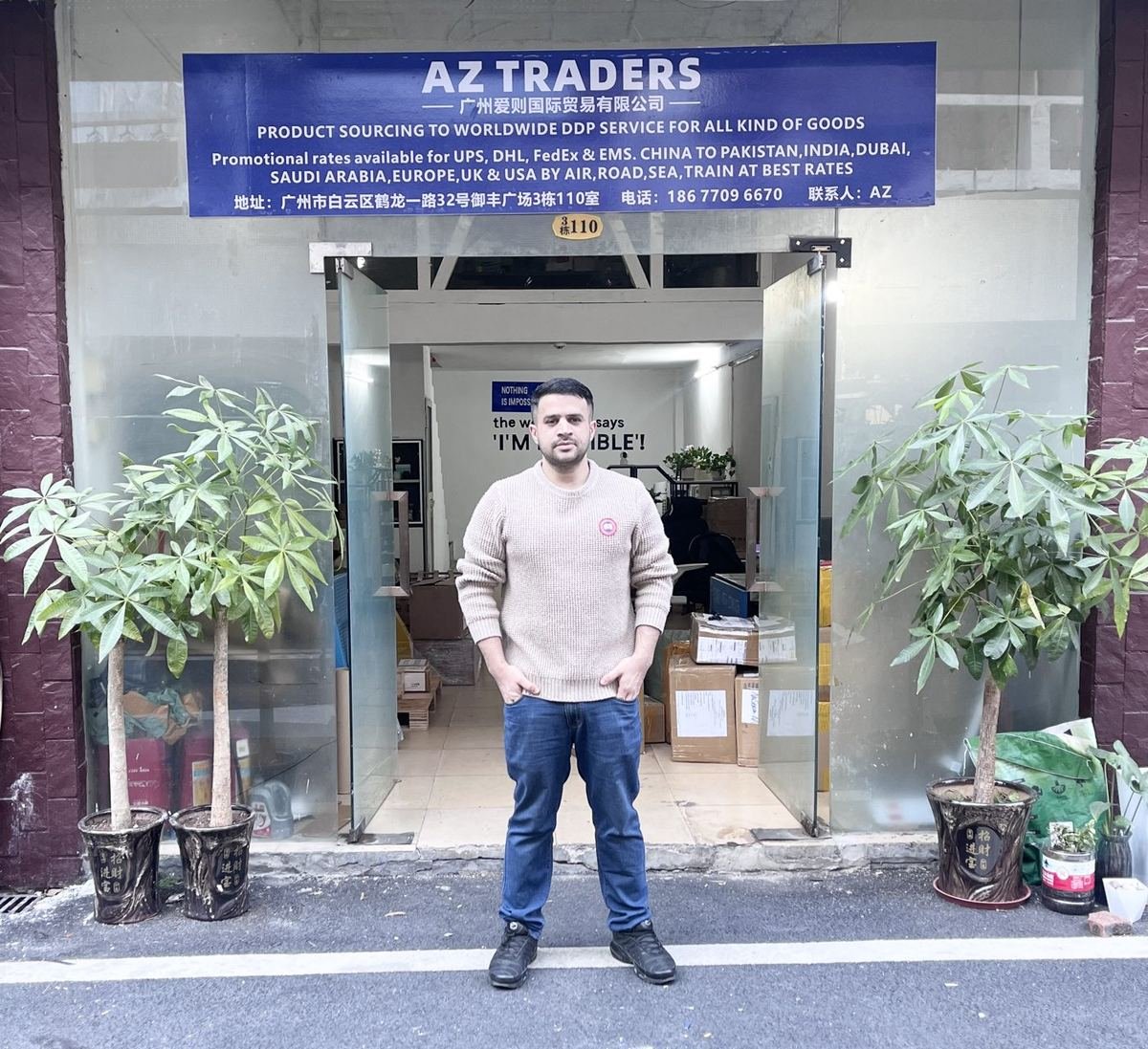 Our founder standing at the entrance of the AZ Traders office in Guangzhou